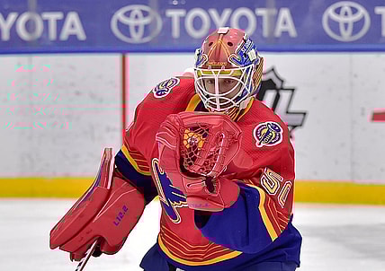 Feb 22, 2021; St. Louis, Missouri, USA;  St. Louis Blues goaltender Jordan Binnington (50) makes a glove save during the second period against the Los Angeles Kings at Enterprise Center. Mandatory Credit: Jeff Curry-USA TODAY Sports
