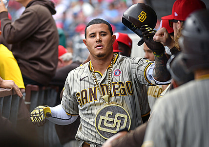 Jul 4, 2021; Philadelphia, Pennsylvania, USA; San Diego Padres third baseman Manny Machado (13) celebrates with teammates after hitting a two run home run against the Philadelphia Phillies during the first inning at Citizens Bank Park. Mandatory Credit: Eric Hartline-USA TODAY Sports