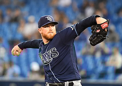 Sep 14, 2021; Toronto, Ontario, CAN; Tampa Bay Rays starting pitcher Drew Rasmussen (57) delivers against the Toronto Blue Jays in the first inning at Rogers Centre. Mandatory Credit: Dan Hamilton-USA TODAY Sports