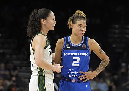 Aug 12, 2021; Phoenix, Arizona, USA; Seattle Storm guard Sue Bird (10) and Connecticut Sun guard Natisha Hiedeman (2) look on in the first half during the Inaugural WNBA Commissioners Cup Championship Game at Footprint Center. Mandatory Credit: Rick Scuteri-USA TODAY Sports