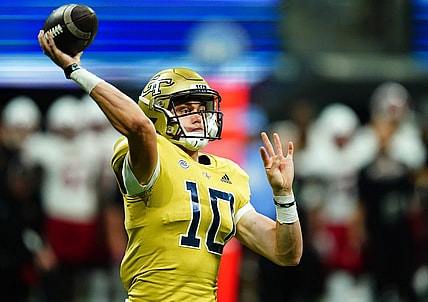 Sep 1, 2023; Atlanta, Georgia, USA; Georgia Tech Yellow Jackets quarterback Haynes King (10) passing against the Louisville Cardinals during the second half at Mercedes-Benz Stadium. Mandatory Credit: John David Mercer-USA TODAY Sports