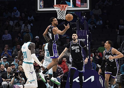 Jan 10, 2024; Charlotte, North Carolina, USA; Sacramento Kings forward Trey Lyles (41) gets a rebound during the first half against the Charlotte Hornets at the Spectrum Center. Mandatory Credit: Sam Sharpe-USA TODAY Sports