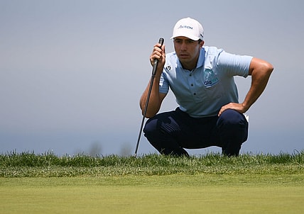Jun 17, 2021; San Diego, California, USA; Alvaro Ortiz lines up a putt on the 14th green during the first round of the U.S. Open golf tournament at Torrey Pines Golf Course. Mandatory Credit: Orlando Ramirez-USA TODAY Sports
