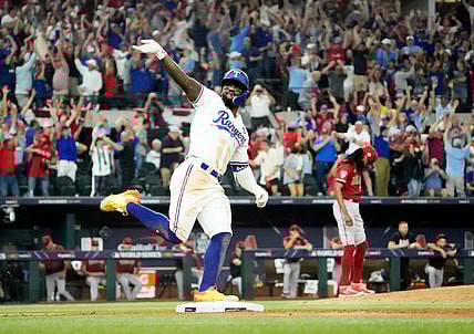Oct 27, 2023; Arlington, Texas, USA; Texas Rangers Adolis Garcia (53) hits a walk-off home run off Arizona Diamondbacks relief pitcher Miguel Castro (50) in the 11th inning during Game 1 of 2023 World Series at Globe Life Field. Mandatory Credit: Rob Schumacher-Arizona Republic