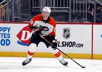 Feb 25, 2024; Pittsburgh, Pennsylvania, USA;  Philadelphia Flyers defenseman Nick Seeler (24) handles the puck against the Pittsburgh Penguins during the first period at PPG Paints Arena. Mandatory Credit: Charles LeClaire-USA TODAY Sports