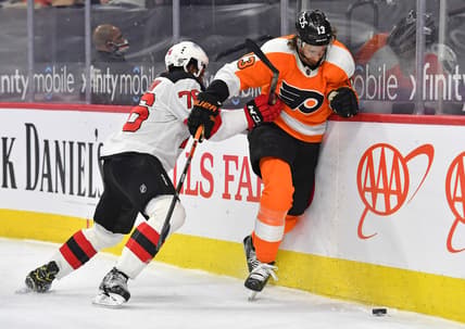 Mar 23, 2021; Philadelphia, Pennsylvania, USA; New Jersey Devils defenseman P.K. Subban (76) checks Philadelphia Flyers center Kevin Hayes (13) during the first period at Wells Fargo Center. Mandatory Credit: Eric Hartline-USA TODAY Sports