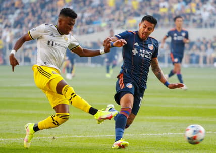 Columbus Crew midfielder Luis Diaz (12) kicks the ball past FC Cincinnati defender Ronald Matarrita (18) during the first half of a MLS match between the Columbus Crew and FC Cincinnati on Friday, Aug. 27, 2021 at Lower.com Field in Columbus, Ohio.

Mls Fc Cincinnati At Columbus Crew