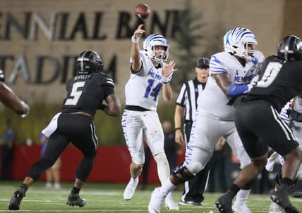 Memphis Tigers quarterback Seth Henigan throws the ball against the Arkansas State Red Wolves during their game at Centennial Bank Stadium in Jonesboro, Ark. On Sept. 11, 2021.
Jrca1930
