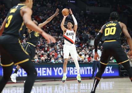 Feb 24, 2022; Portland, Oregon, USA;  Portland Trail Blazers guard Anfernee Simons (1) shoots the ball against the Golden State Warriors in the first half at Moda Center. Mandatory Credit: Jaime Valdez-USA TODAY Sports