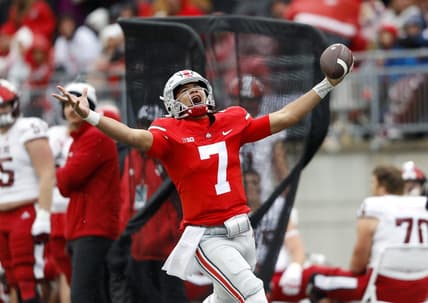 Nov 12, 2022; Columbus, Ohio, USA;  Ohio State Buckeyes quarterback C.J. Stroud (7) runs for the first down during the third quarter against the Indiana Hoosiers at Ohio Stadium. Mandatory Credit: Joseph Maiorana-USA TODAY Sports