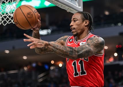 Nov 23, 2022; Milwaukee, Wisconsin, USA; Chicago Bulls forward DeMar DeRozan (11) gets a pass away in the second quarter during game against the Milwaukee Bucks at Fiserv Forum. Mandatory Credit: Benny Sieu-USA TODAY Sports
