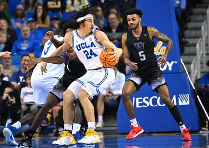 Feb 2, 2023; Los Angeles, California, USA; UCLA Bruins guard Jaime Jaquez Jr. (24) works his way to the basket past Washington Huskies guard Jamal Bey (5) in the first half at Pauley Pavilion presented by Wescom. Mandatory Credit: Jayne Kamin-Oncea-USA TODAY Sports