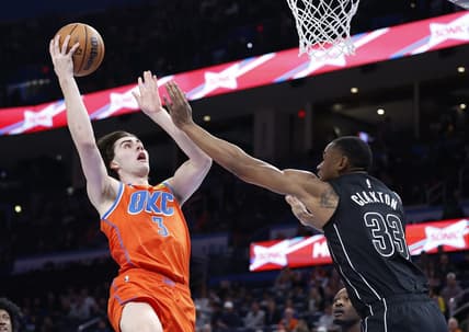 Mar 14, 2023; Oklahoma City, Oklahoma, USA; Oklahoma City Thunder guard Josh Giddey (3) shoots as Brooklyn Nets center Nic Claxton (33) defends the shot during the second half at Paycom Center. Oklahoma City won 121-107. Mandatory Credit: Alonzo Adams-USA TODAY Sports