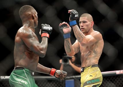 Nov 12, 2022; New York, NY, USA; Israel Adesanya (red gloves) and Alex Pereira (blue gloves) during UFC 281 at Madison Square Garden. Mandatory Credit: Jessica Alcheh-USA TODAY Sports