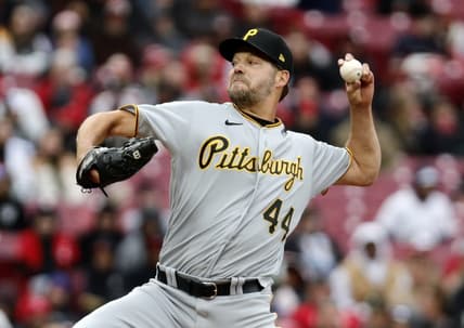 Apr 1, 2023; Cincinnati, Ohio, USA; Pittsburgh Pirates starting pitcher Rich Hill (44) throws against the Cincinnati Reds during the first inning at Great American Ball Park. Mandatory Credit: David Kohl-USA TODAY Sports