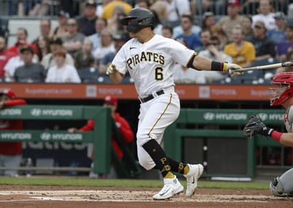 Apr 21, 2023; Pittsburgh, Pennsylvania, USA; Pittsburgh Pirates second baseman Mark Mathias (6) hits a two run single against the Cincinnati Reds during the second inning at PNC Park. Mandatory Credit: Charles LeClaire-USA TODAY Sports