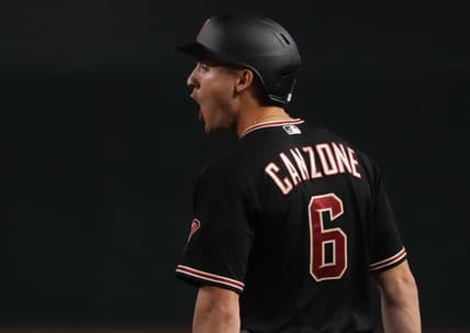 Jul 29, 2023; Phoenix, Arizona, USA; Arizona Diamondbacks designated hitter Dominic Canzone (6) reacts after hitting an RBI single against the Seattle Mariners during the eighth inning at Chase Field. Mandatory Credit: Joe Camporeale-USA TODAY Sports