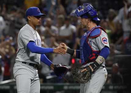 Aug 24, 2023; Pittsburgh, Pennsylvania, USA;  Chicago Cubs relief pitcher Adbert Alzolay (73) and catcher Yan Gomes (15) shake hands after defeating the Pittsburgh Pirates at PNC Park. Mandatory Credit: Charles LeClaire-USA TODAY Sports
