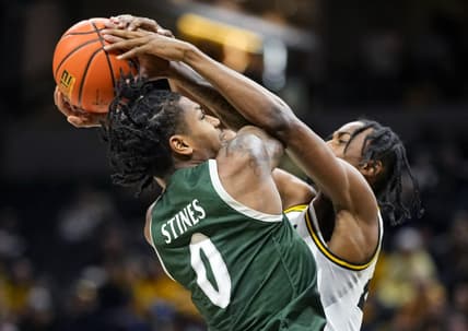 Nov 25, 2023; Columbia, Missouri, USA; Missouri Tigers forward Aidan Shaw (23) blocks the shot of Loyola (Md) Greyhounds guard D'Angelo Stines (0) during the first half at Mizzou Arena. Mandatory Credit: Jay Biggerstaff-USA TODAY Sports