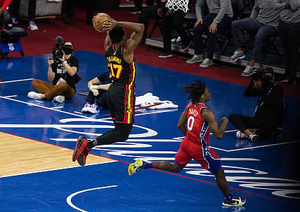 Jun 6, 2021; Philadelphia, Pennsylvania, USA; Atlanta Hawks forward Onyeka Okongwu (17) drives for a dunk past Philadelphia 76ers guard Tyrese Maxey (0) during the second quarter of game one in the second round of the 2021 NBA Playoffs at Wells Fargo Center. Mandatory Credit: Bill Streicher-USA TODAY Sports