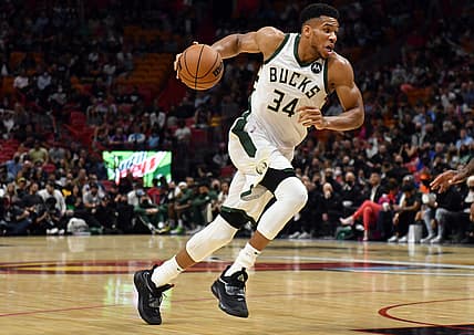 Dec 8, 2021; Miami, Florida, USA; Milwaukee Bucks forward Giannis Antetokounmpo (34) drives to the basket against the Miami Heat in the first half at FTX Arena. Mandatory Credit: Jim Rassol-USA TODAY Sports