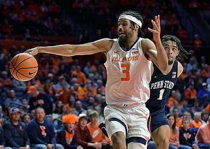 Mar 3, 2022; Champaign, Illinois, USA;  Illinois Fighting Illini guard/forward Jacob Grandison (3) loses control of the ball in front of Penn State Nittany Lions forward Seth Lundy (1) during the first half at State Farm Center. Mandatory Credit: Ron Johnson-USA TODAY Sports