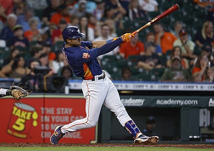 Jun 12, 2022; Houston, Texas, USA; Houston Astros shortstop Jeremy Pena (3) hits a home run during the fourth inning against the Miami Marlins at Minute Maid Park. Mandatory Credit: Troy Taormina-USA TODAY Sports