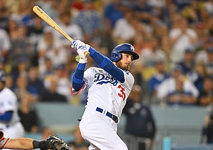 Jul 22, 2022; Los Angeles, California, USA;  Los Angeles Dodgers center fielder Cody Bellinger (35) hits a grand slam home run in the eighth inning against the San Francisco Giants at Dodger Stadium. Mandatory Credit: Jayne Kamin-Oncea-USA TODAY Sports