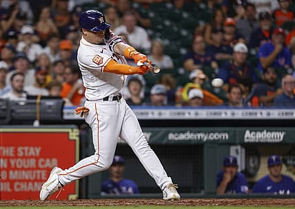 Aug 10, 2022; Houston, Texas, USA; Houston Astros pinch hitter Aledmys Diaz (16) hits a single during the eighth inning against the Texas Rangers at Minute Maid Park. Mandatory Credit: Troy Taormina-USA TODAY Sports