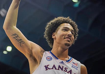 Nov 7, 2022; Lawrence, Kansas, USA; Kansas Jayhawks forward Jalen Wilson (10) celebrates with teammates after a score against the Omaha Mavericks during the second half at Allen Fieldhouse. Mandatory Credit: Denny Medley-USA TODAY Sports