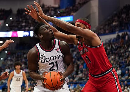 Jan 15, 2023; Hartford, Connecticut, USA; UConn Huskies forward Adama Sanogo (21) looks to shoot against St. John's Red Storm center Joel Soriano (11) in the first half at XL Center. Mandatory Credit: David Butler II-USA TODAY Sports