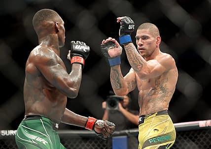 Nov 12, 2022; New York, NY, USA; Israel Adesanya (red gloves) and Alex Pereira (blue gloves) during UFC 281 at Madison Square Garden. Mandatory Credit: Jessica Alcheh-USA TODAY Sports