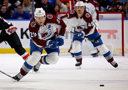 Oct 29, 2023; Buffalo, New York, USA;  Colorado Avalanche center Nathan MacKinnon (29) skates up ice for a loose puck during the first period against the Buffalo Sabres at KeyBank Center. Mandatory Credit: Timothy T. Ludwig-USA TODAY Sports