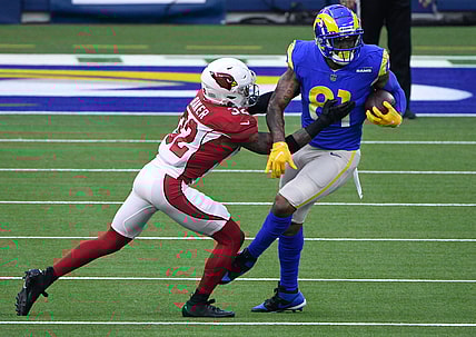 Jan 3, 2021; Inglewood, California, USA; Arizona Cardinals strong safety Budda Baker (32) tackles Los Angeles Rams tight end Gerald Everett (81) during the second half at SoFi Stadium. Mandatory Credit: Robert Hanashiro-USA TODAY Sports