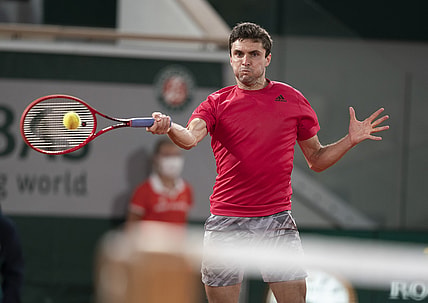 Sep 29, Paris, France; Gilles Simon (FRA) in action during his match against Denis Shapovalov (CAN) on day three at Stade Roland Garros. Mandatory Credit: Susan Mullane-USA TODAY Sports