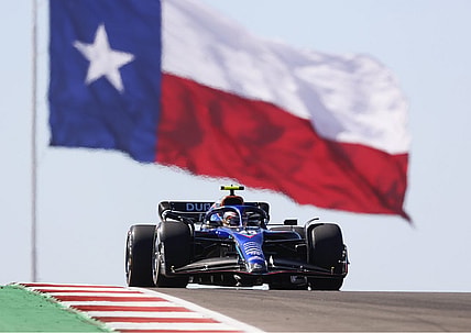 Oct 21, 2022; Austin, Texas, USA;  Williams Mercedes driver Logan Sargeant (45) passes the Texas flag during practice for the U.S. Grand Prix at Circuit of the Americas. Mandatory Credit: Erich Schlegel-USA TODAY Sports