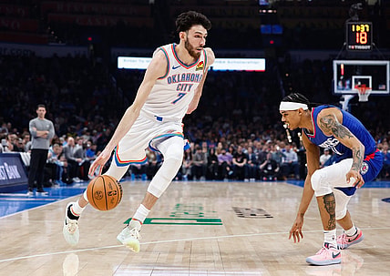 Dec 21, 2023; Oklahoma City, Oklahoma, USA; Oklahoma City Thunder forward Chet Holmgren (7) drives to the basket against LA Clippers guard Brandon Boston Jr. (4) during the second quarter at Paycom Center. Mandatory Credit: Alonzo Adams-USA TODAY Sports