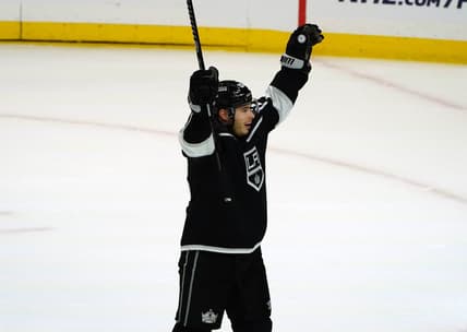 Mar 21, 2021; Los Angeles, California, USA; Los Angeles Kings right wing Dustin Brown (23) celebrates the 3-1 victory against the Vegas Golden Knights at Staples Center. Mandatory Credit: Gary A. Vasquez-USA TODAY Sports