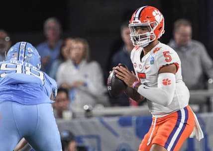 Clemson quarterback DJ Uiagalelei (5) fades back to pass near North Carolina defensive lineman Kevin Hester (98) during the first quarter of the ACC Championship football game at Bank of America Stadium in Charlotte, North Carolina Saturday, Dec 3, 2022.

Clemson Tigers Football Vs North Carolina Tar Heels Acc Championship Charlotte Nc