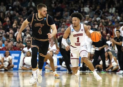 Mar 22, 2024; Spokane, WA, USA; Alabama Crimson Tide guard Mark Sears (1) dribbles against Charleston Cougars guard Bryce Butler (4) during the first half in the first round of the 2024 NCAA Tournament at Spokane Veterans Memorial Arena. Mandatory Credit: Kirby Lee-USA TODAY Sports