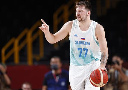 Jul 29, 2021; Saitama, Japan; Slovenia player Luka Doncic (77) dribbles while playing Japan during the Tokyo 2020 Olympic Summer Games at Saitama Super Arena. Mandatory Credit: Yukihito Taguchi-USA TODAY Sports