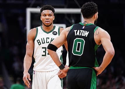May 1, 2022; Boston, Massachusetts, USA; Milwaukee Bucks forward Giannis Antetokounmpo (34) and Boston Celtics forward Jayson Tatum (0) on the court in the second half during game one of the second round for the 2022 NBA playoffs at TD Garden. Mandatory Credit: David Butler II-USA TODAY Sports