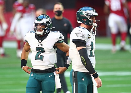 Dec 20, 2020; Glendale, Arizona, USA; Philadelphia Eagles quarterback Jalen Hurts (2) and Carson Wentz (11) against the Arizona Cardinals at State Farm Stadium. Mandatory Credit: Mark J. Rebilas-USA TODAY Sports