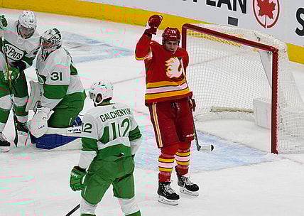Mar 19, 2021; Toronto, Ontario, CAN; Calgary Flames forward Milan Lucic (17) celebrates a goal by Calgary Flames forward Derek Ryan (not pictured) during the first period against the Toronto Maple Leafs at Scotiabank Arena. Mandatory Credit: John E. Sokolowski-USA TODAY Sports