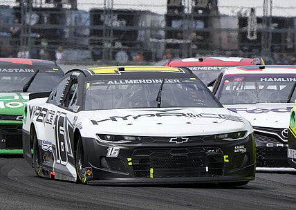 Aug 15, 2021; Speedway, Indiana, USA; NASCAR Cup Series driver AJ Allmendinger (16) during the Verizon 200 at the Brickyard at Indianapolis Motor Speedway Road Course. Mandatory Credit: Mike Dinovo-USA TODAY Sports