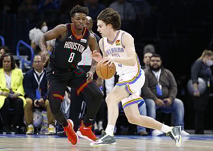 Nov 17, 2021; Oklahoma City, Oklahoma, USA; Oklahoma City Thunder guard Josh Giddey (3) drives to the basket against Houston Rockets forward Jae'Sean Tate (8) during the first quarter at Paycom Center. Mandatory Credit: Alonzo Adams-USA TODAY Sports