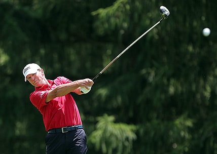 Steve Stricker watches his ball down the fairway on the 13th hole during third round of the Bridgestone Senior Players Championship at Firestone Country Club on Saturday.

Bridgestone 8