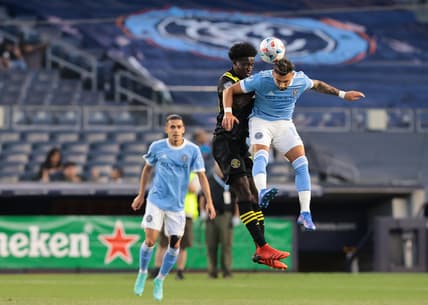 Jul 30, 2021; New York, New York, USA; New York City FC midfielder Valentin Castellanos (11) battles Columbus Crew SC defender Aboubacar Keita (30) for a high ball during the first half at Yankee Stadium. Mandatory Credit: Vincent Carchietta-USA TODAY Sports