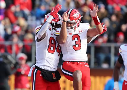 Nov 27, 2021; Piscataway, New Jersey, USA; Maryland Terrapins tight end Corey Dyches (84) celebrates his touchdown with quarterback Taulia Tagovailoa (3) during the second half against the Rutgers Scarlet Knights at SHI Stadium. Mandatory Credit: Vincent Carchietta-USA TODAY Sports