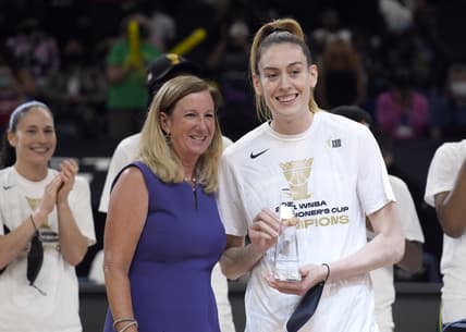 Aug 12, 2021; Phoenix, Arizona, USA; WNBA commissioner Cathy Engelbert and Seattle Storm forward Breanna Stewart (30) pose with the MVP trophy after a victory by Seattle over the Connecticut Sun during the Inaugural WNBA Commissioners Cup Championship Game at Footprint Center. Mandatory Credit: Rick Scuteri-USA TODAY Sports